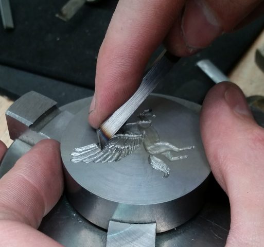 hand-engraving a seal | bolsons.co.uk