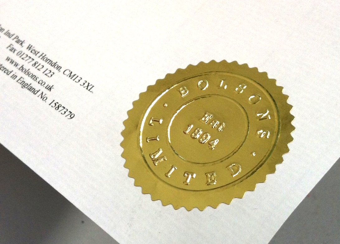 an embossed gold seal wafer.